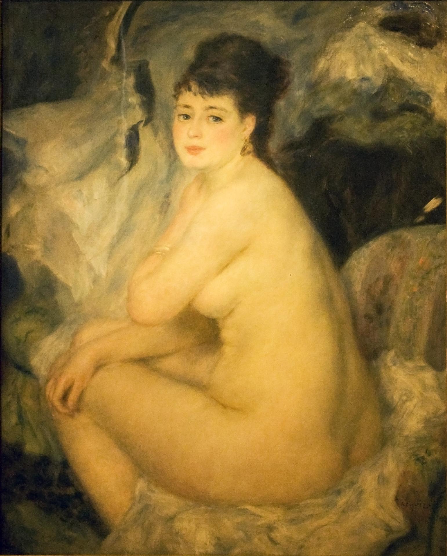 Nude nude woman sitting on a couch anna